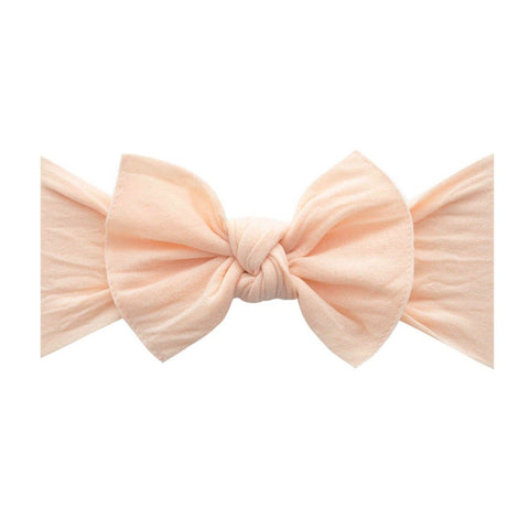 KNOT bow in peach by Baby Bling